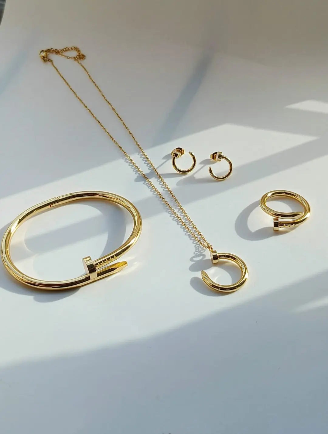 Nail Shape Gold Jewelry Set – Necklace, Bracelet, Ring & Earrings - 07BM